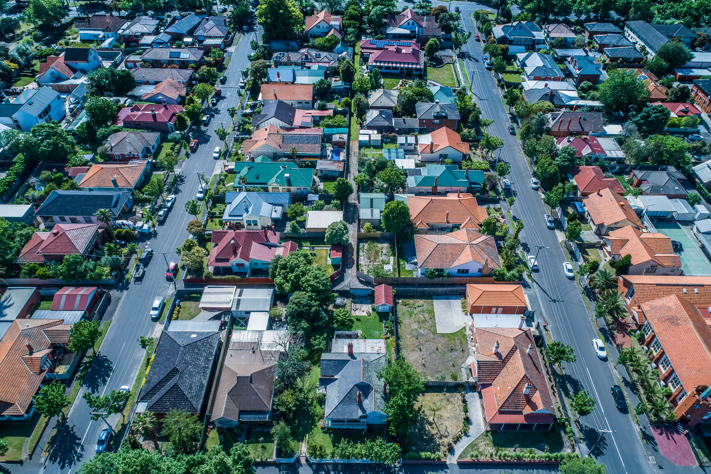 Looking down at houses in typical Australian suburb - aerial view